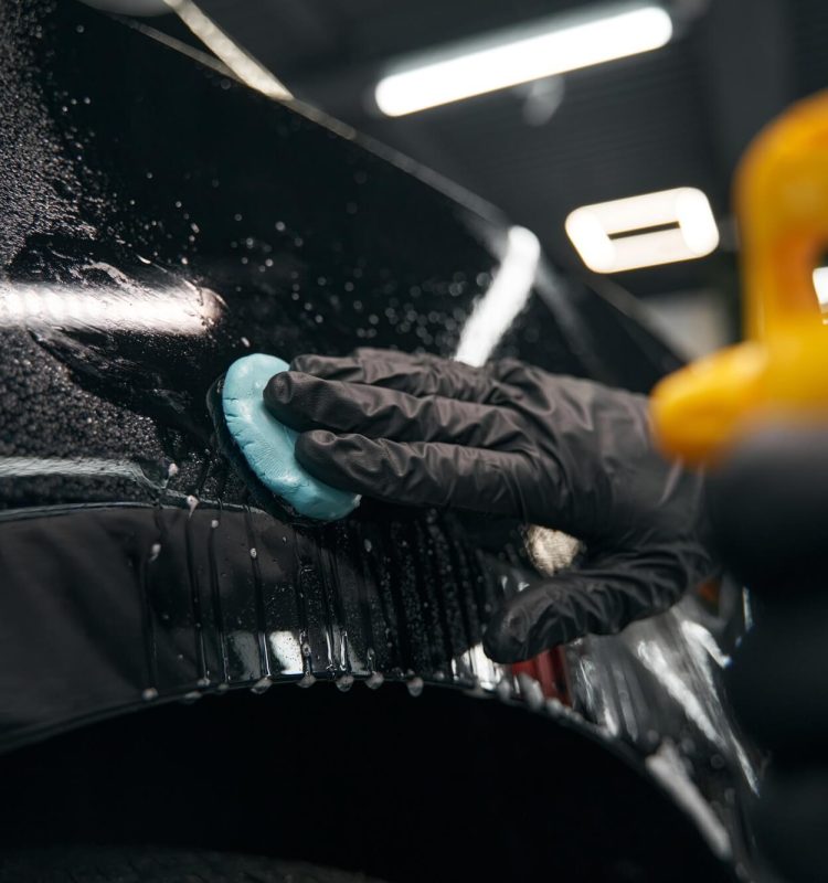 auto-detailing-professional-preparing-automobile-for-polishing.jpg
