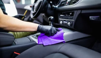 stock-photo-a-man-cleaning-car-interior-car-detailing-or-valeting-concept-selective-focus-743191834-1920w